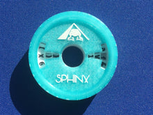 Load image into Gallery viewer, Top view of an Aqua SphinxGadget.
